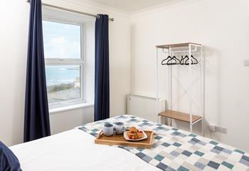 Wake up and tuck into breakfast in bed whilst gazing out at the sea view.
