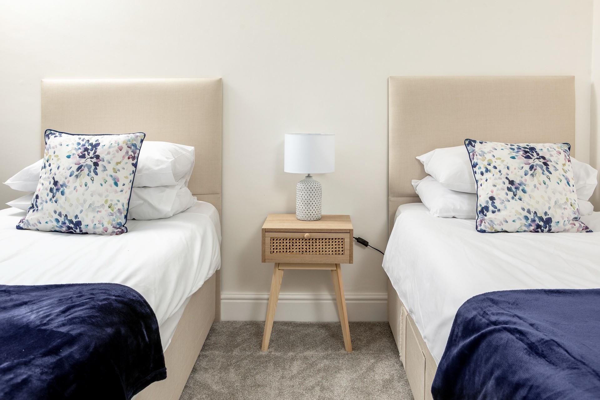 Bedroom 2 has twin beds perfect for children or adults.