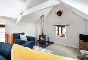 Relax on the sumptuous sofas as the woodburner crackles away.