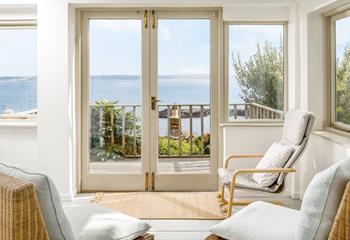 Open the balcony doors and enjoy a mix of indoor and outdoor living in the summer months.