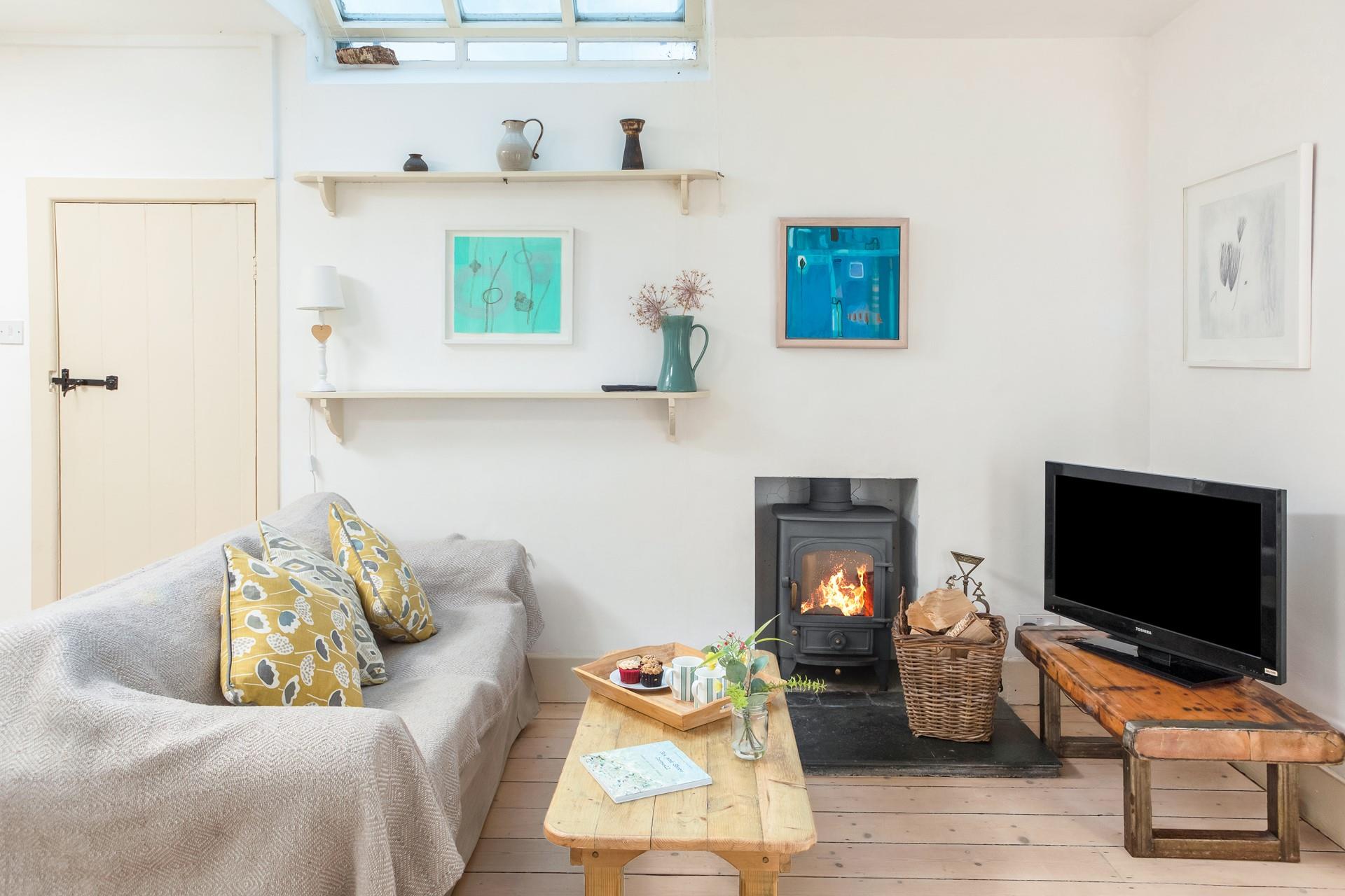 Snuggle up in the sitting room in front of the crackle of the woodburner on chilly evenings.