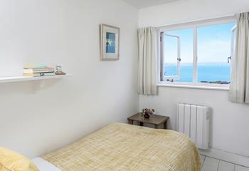 Bedroom 2 has a single bed perfect for adults or children to relax in.