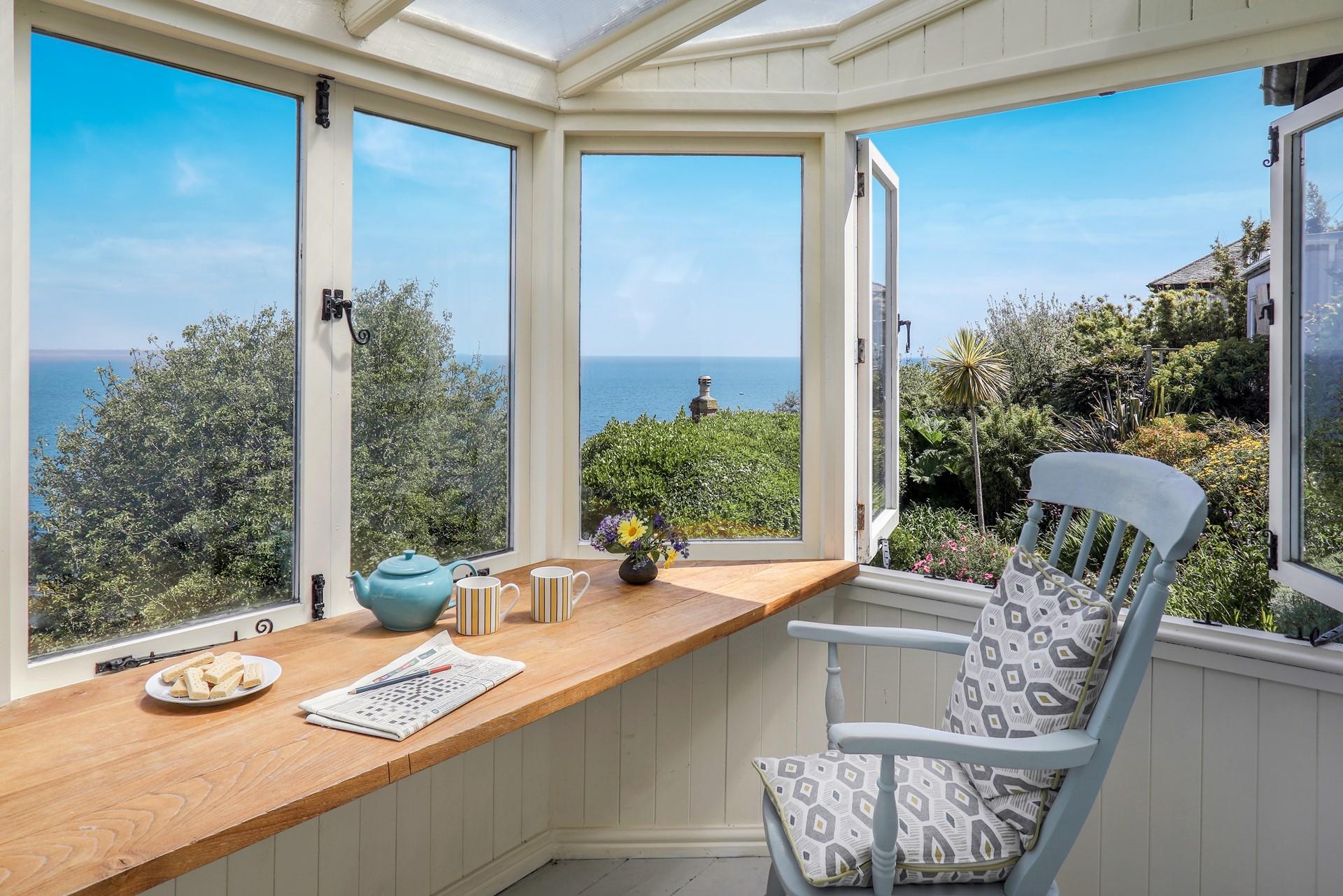 Sit in the sunroom and unwind from a day of exploring.