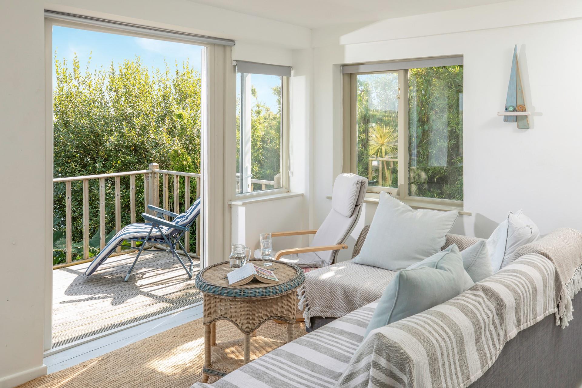 Open the balcony doors and enjoy a mix of indoor and outdoor living in the summer months.