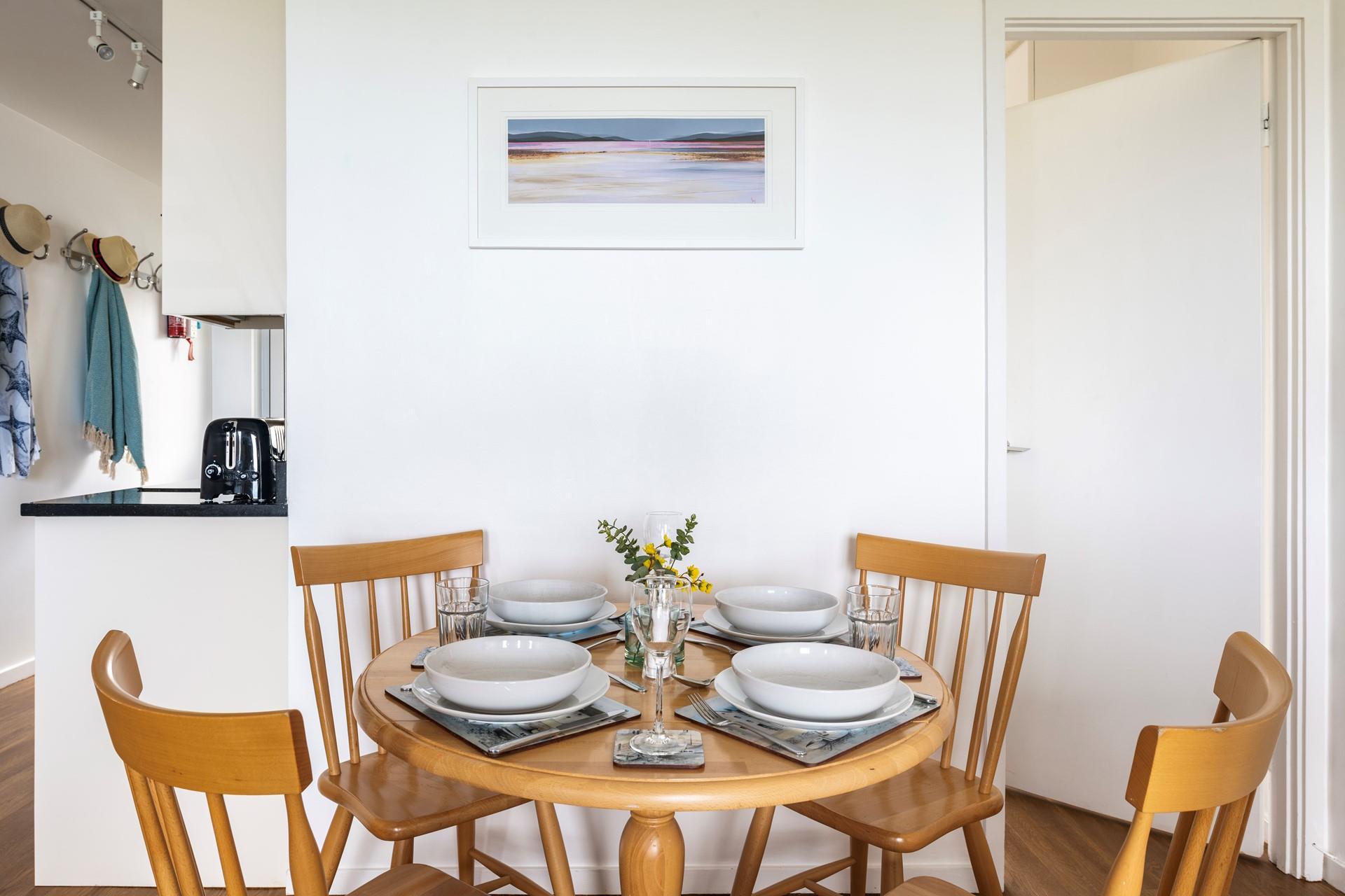 Sit around the dining table and spend time together as a family at meal times.