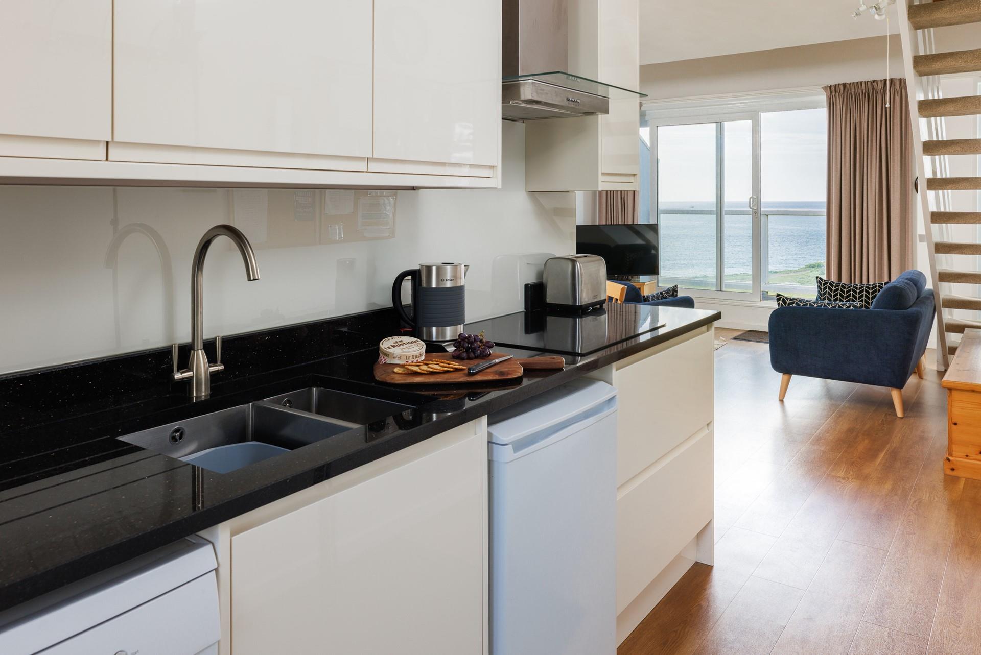 The fully equipped kitchen has all you need to cook a tasty feast.