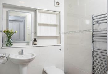 Warm fluffy towels can be taken straight from the heated towel rail after a shower.