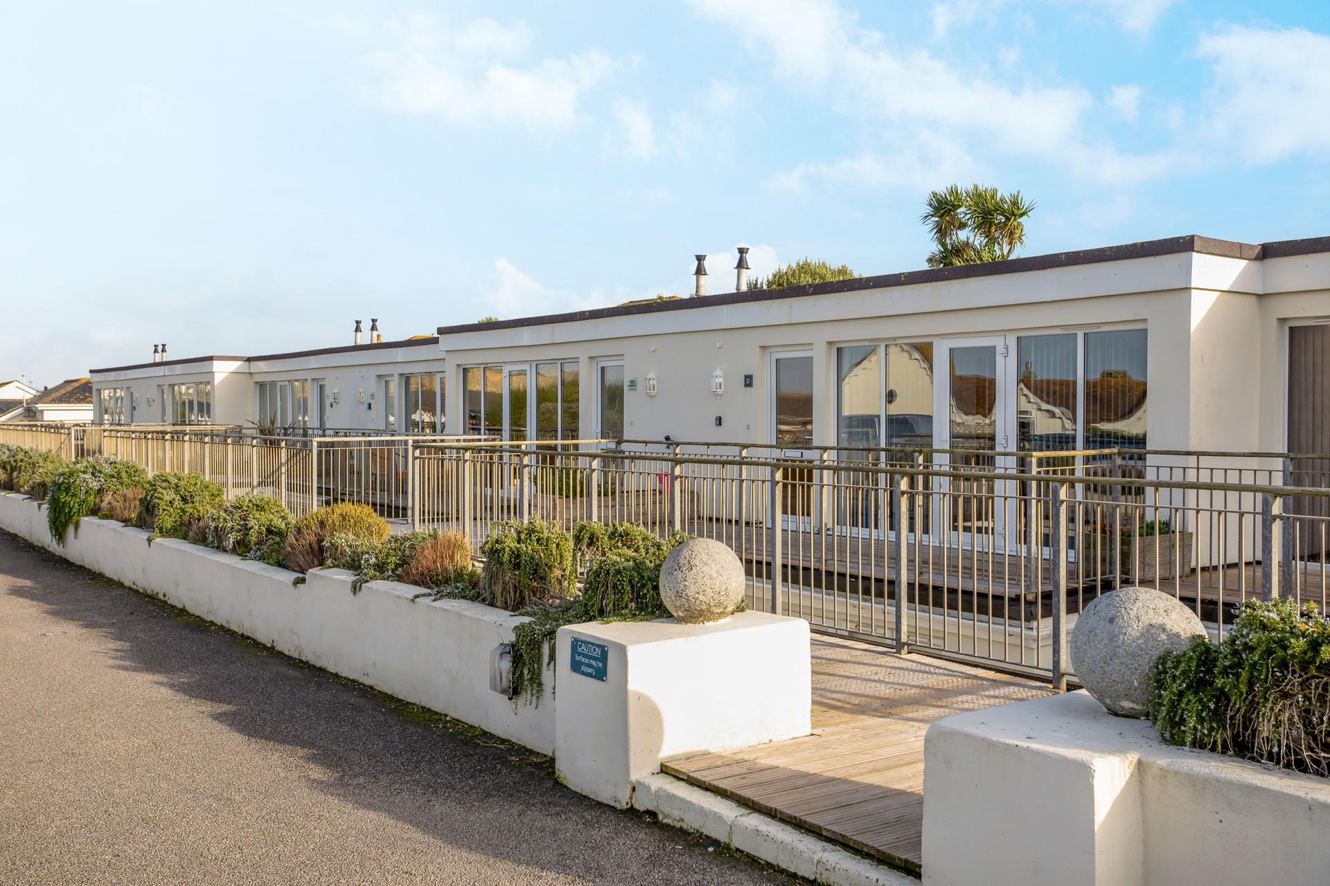 Take a short stroll to Lusty Glaze Beach on a sunny day.