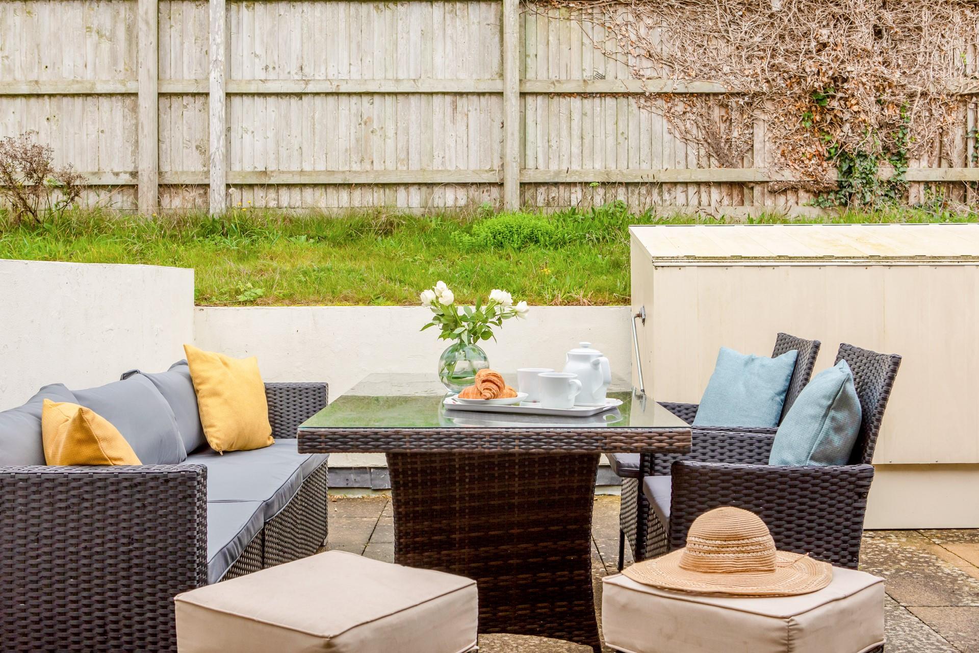 The patio at the rear of the house is an ideal spot for enjoying those balmy, summer evenings. 