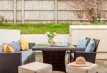 The patio at the rear of the house is an ideal spot for enjoying those balmy, summer evenings. 