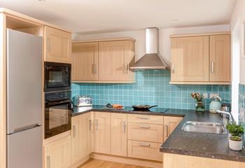 The kitchen provides all you need for a self-catering break, or just for dishing up a tasty takeaway!