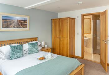 Bedroom 1 benefits from an en suite shower room and comfortable king bed.