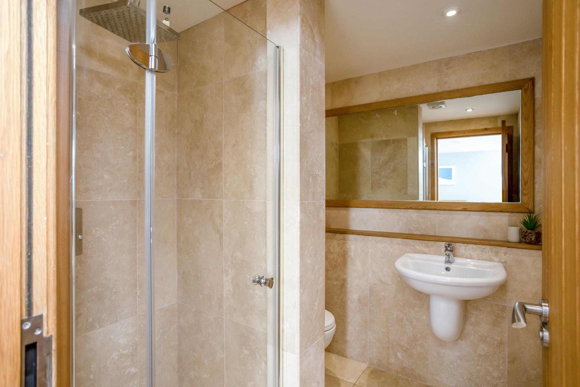 An en suite shower to three of the four bedrooms makes 21 The Watermark a great option for extended families. 