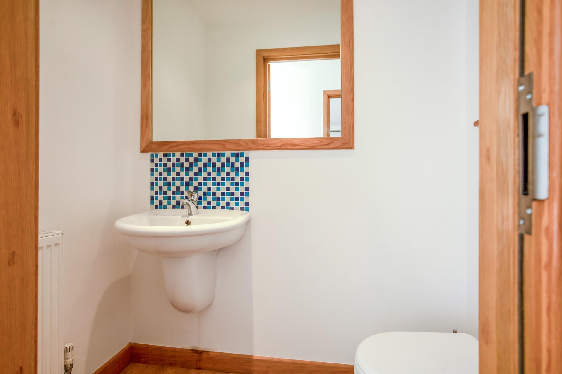 An upstairs cloakroom is a useful addition when using the upper floor space. 
