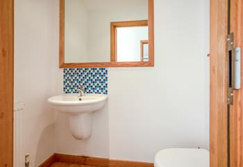 An upstairs cloakroom is a useful addition when using the upper floor space. 