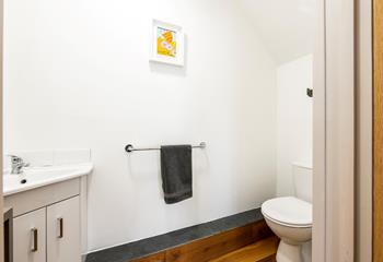 The downstairs cloakroom has an additional WC and basin.