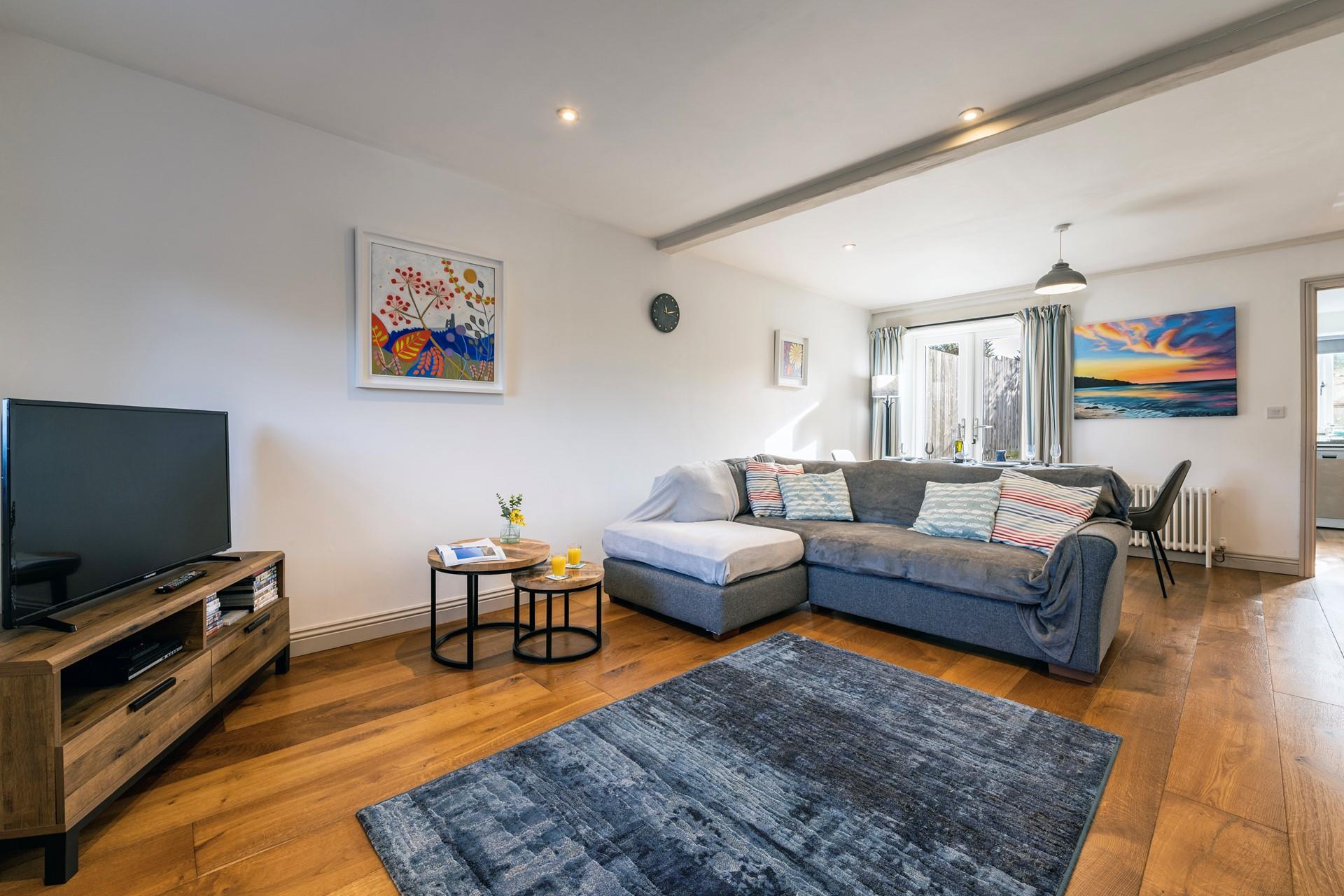 Plush cushions and a sumptuous sofa make the perfect space to unwind.