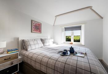 Wake up to countryside views from the comfortable king size bed.