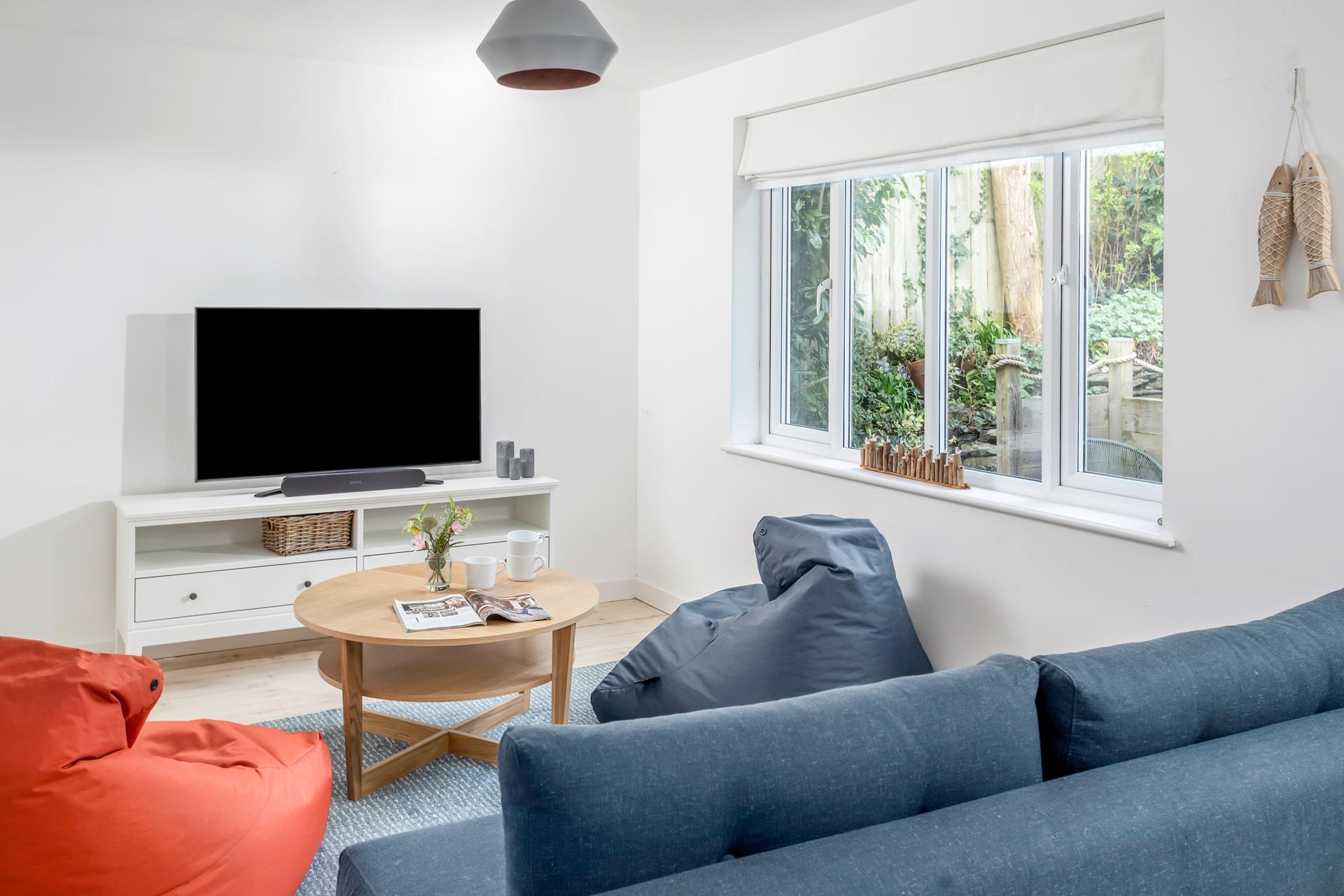 The snug is the perfect spot for the kids to relax and unwind leaving the adults to it in the sitting room.