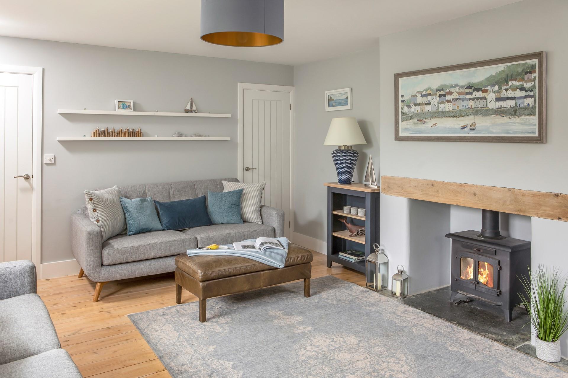 Shades of blue and seaside decor reflect the close proximity to the ocean.