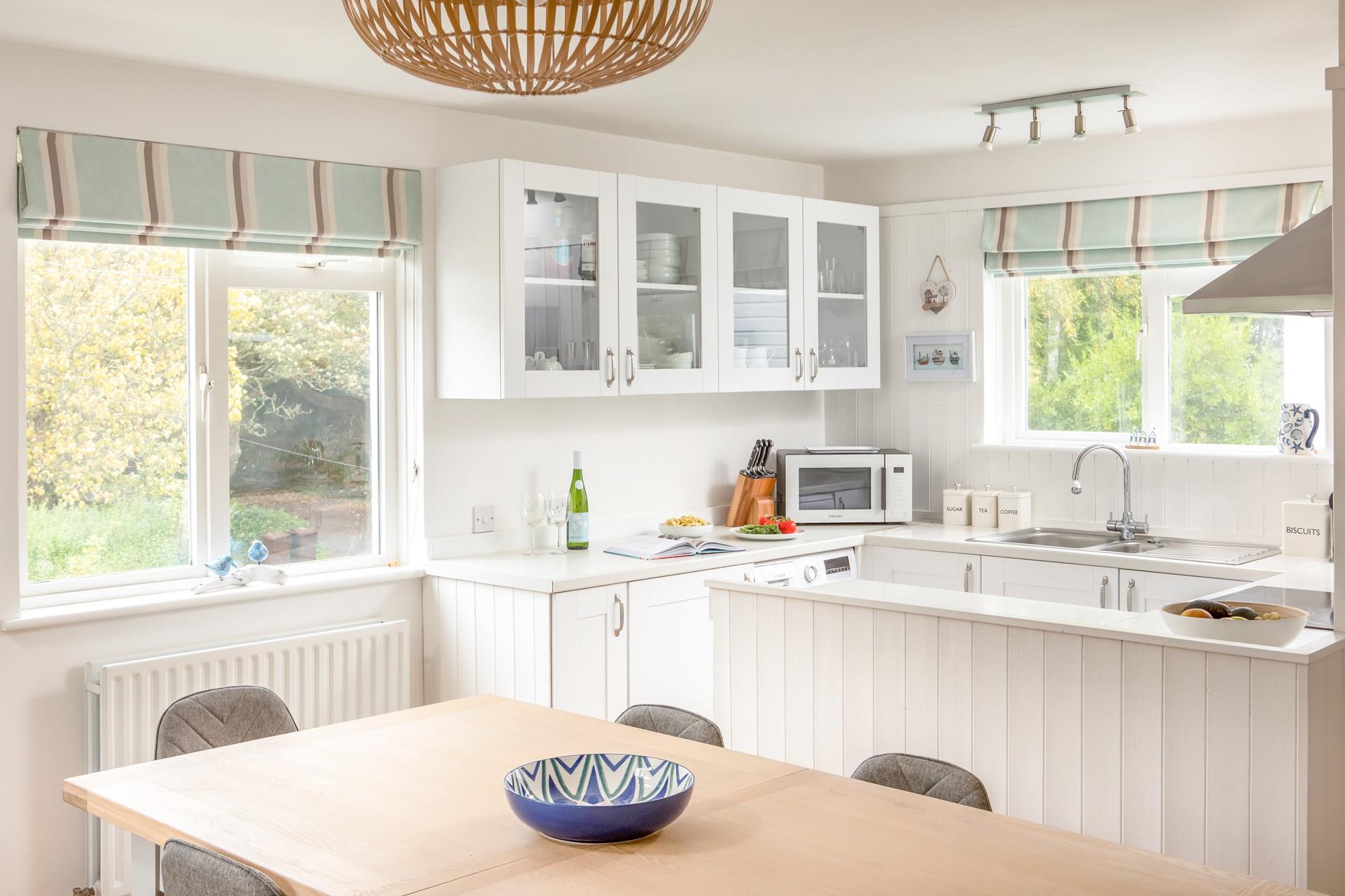 Buy some local ingredients in Mevagissey and cook a family favourite meal.