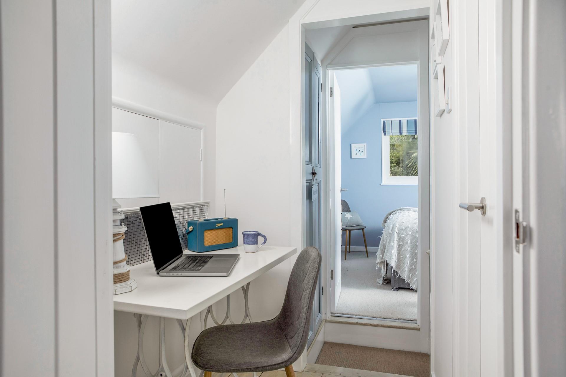 Catch up on emails at the handy desk area.