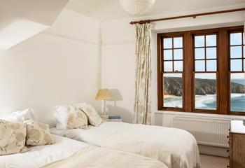 The cosy twin room is a coastal sanctuary, boasting more of the stunning seascapes.