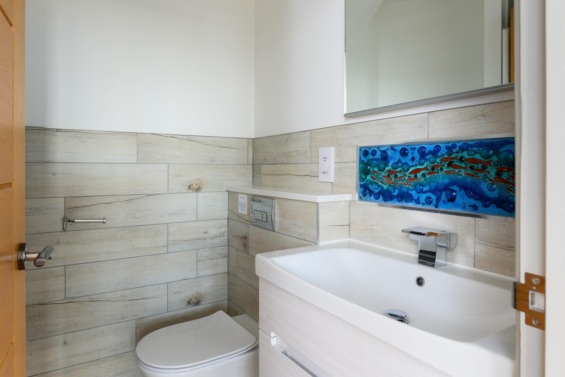 More beautiful Jo Downs artwork above the sink in the en suite.