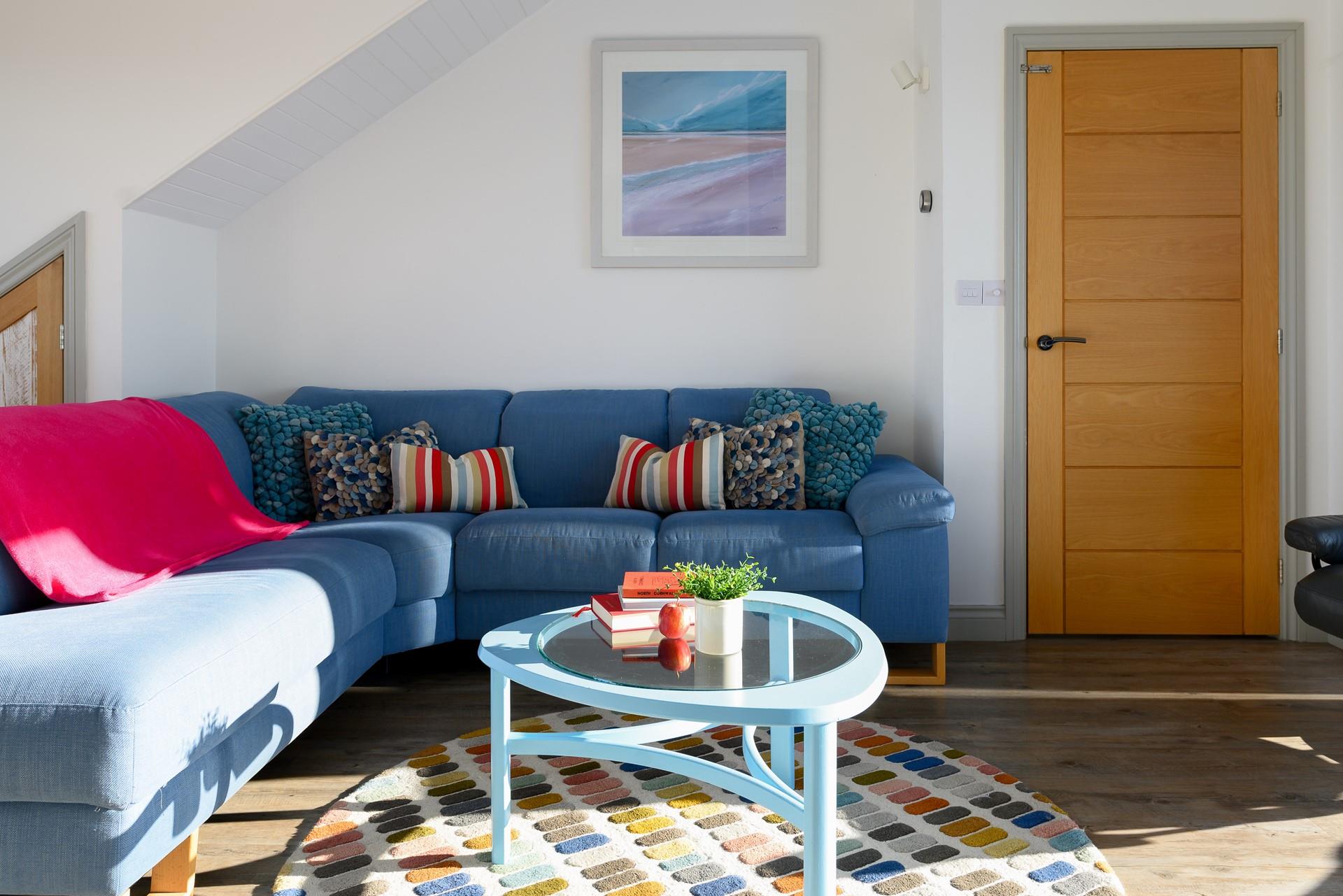 Unwind in the bright and colourful sitting room.
