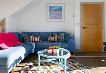 Unwind in the bright and colourful sitting room.