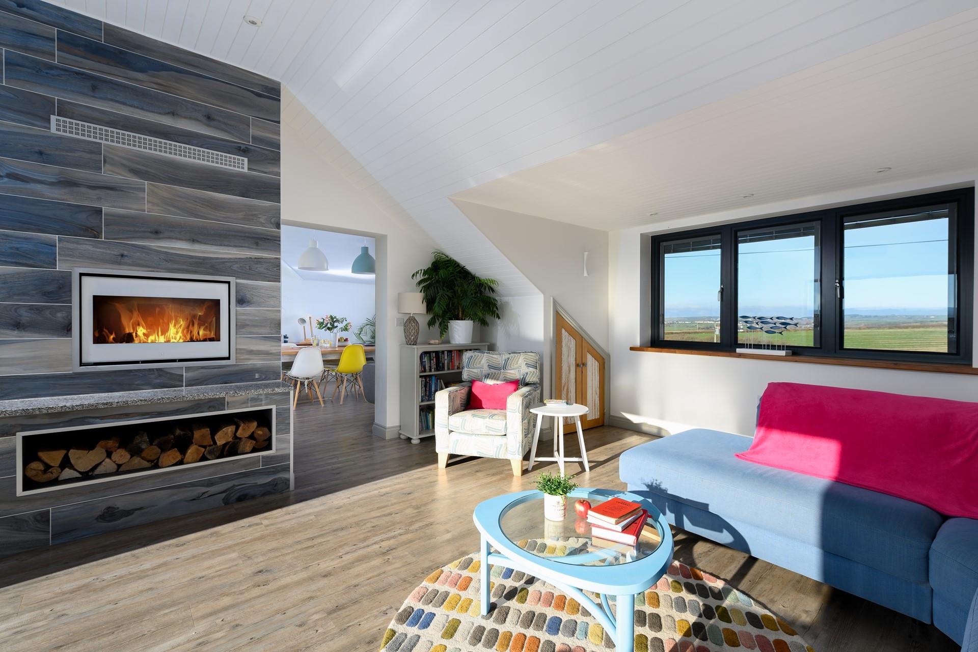 Admire the views across rolling green fields and out to sea.