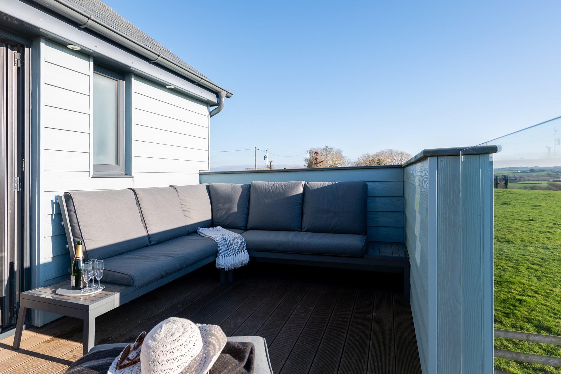 Pour yourself a glass of wine, taking in the sights and sounds of the countryside.