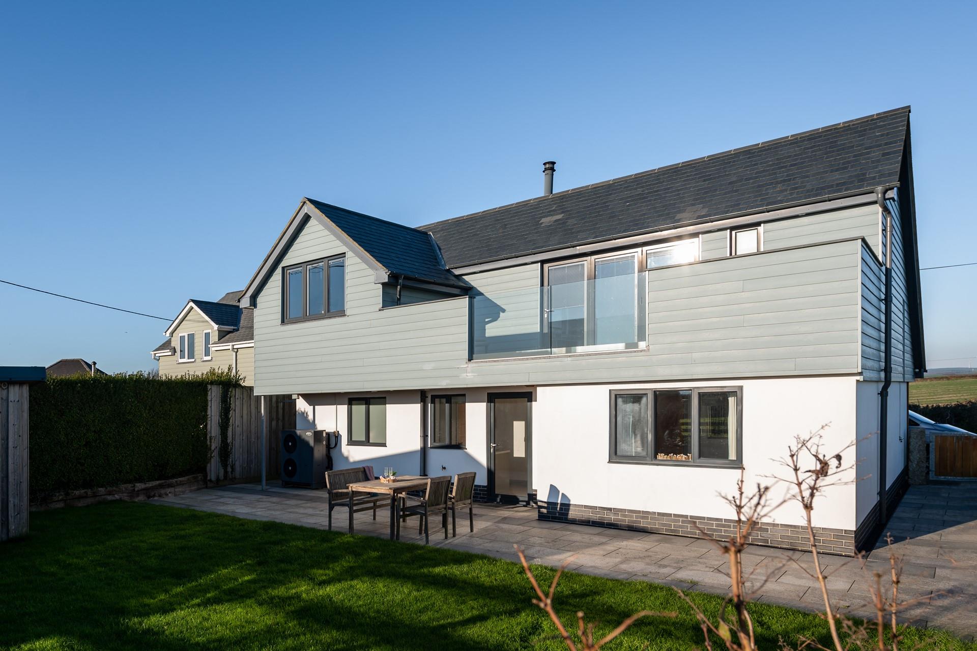 Enjoy the peace and quiet in the enclosed garden as the sun goes down.