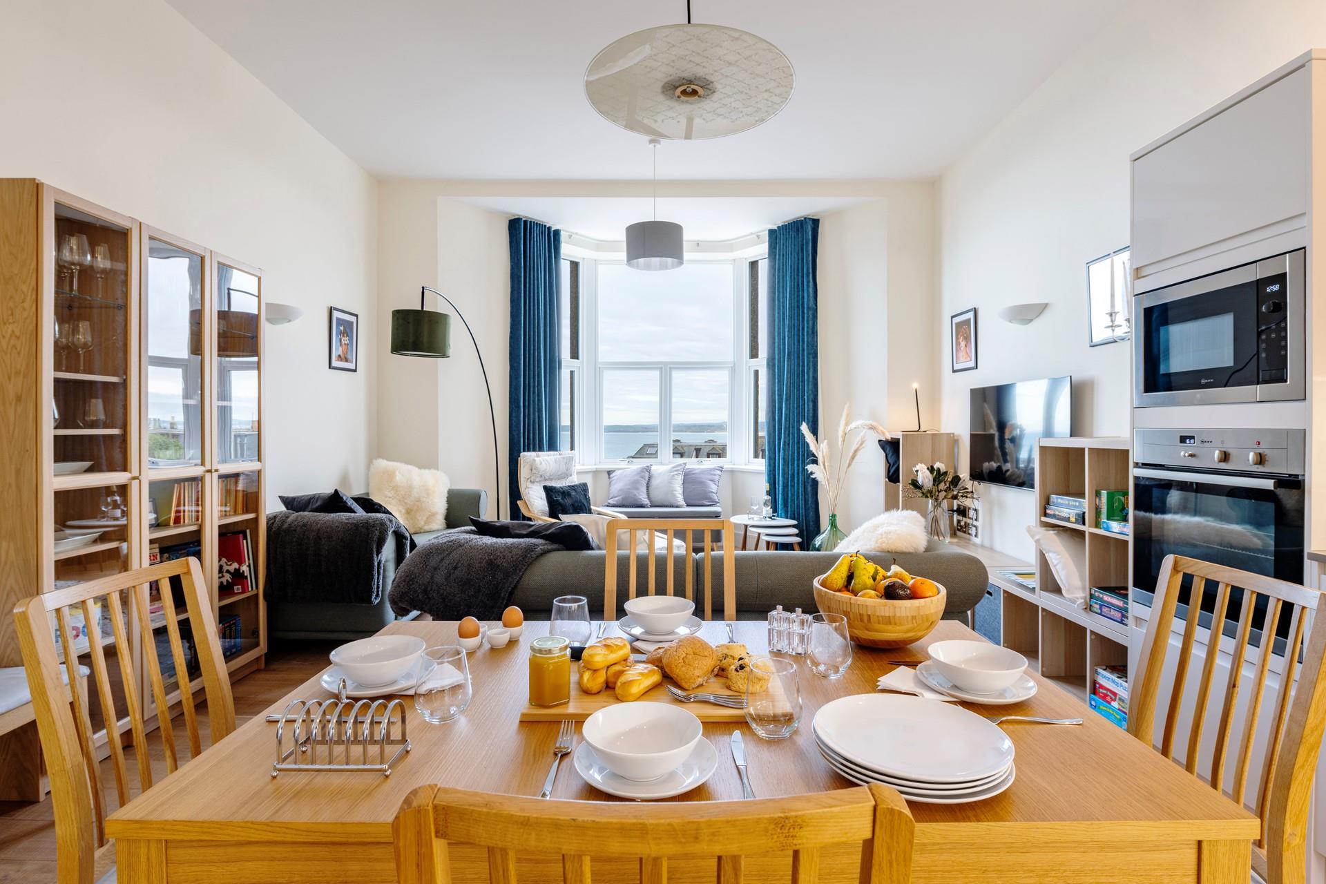 Sit around the dining table and tuck into a tasty breakfast with fresh pastries.