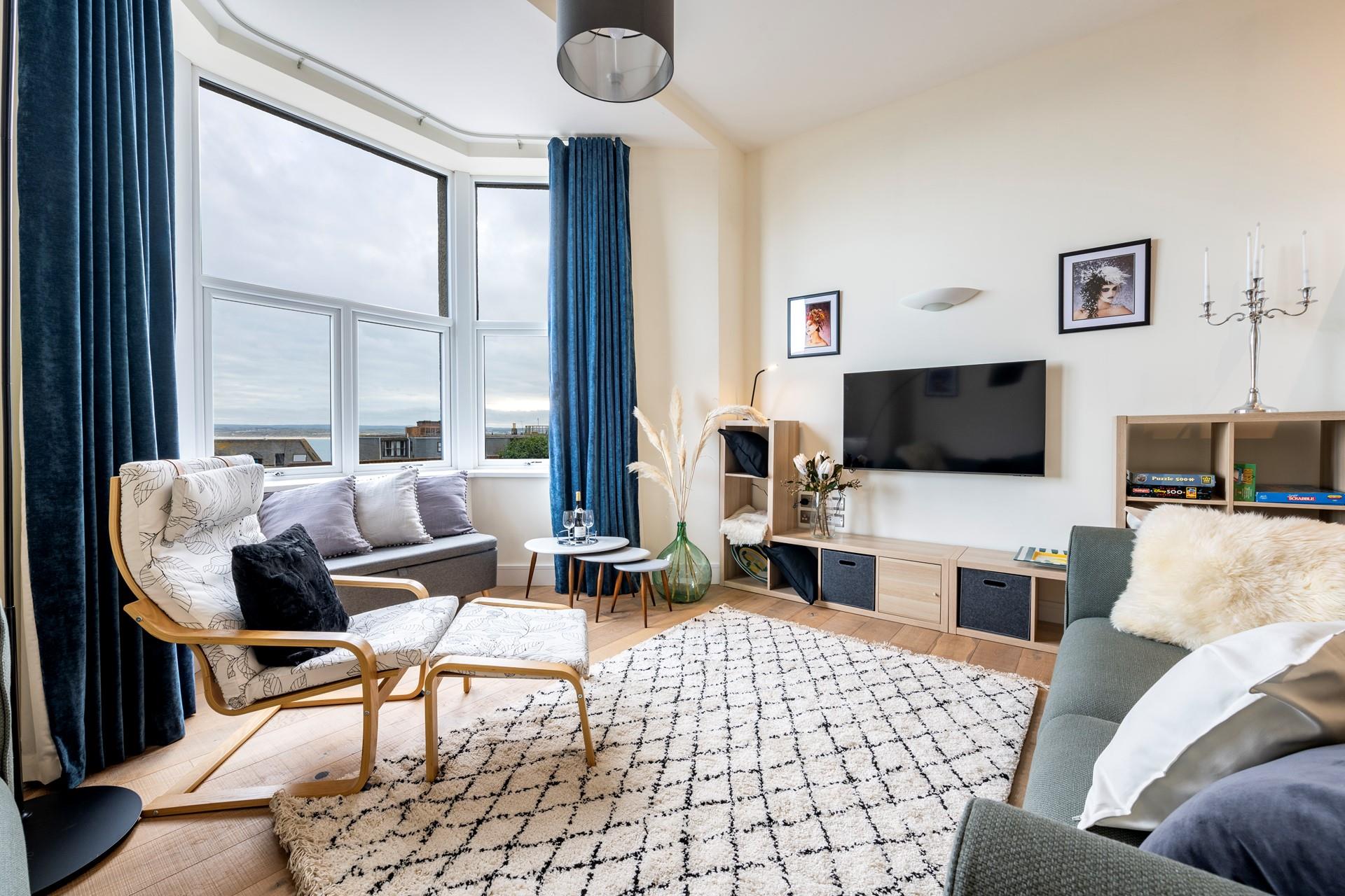 Gaze out at the stunning sea views from the large sitting room window.