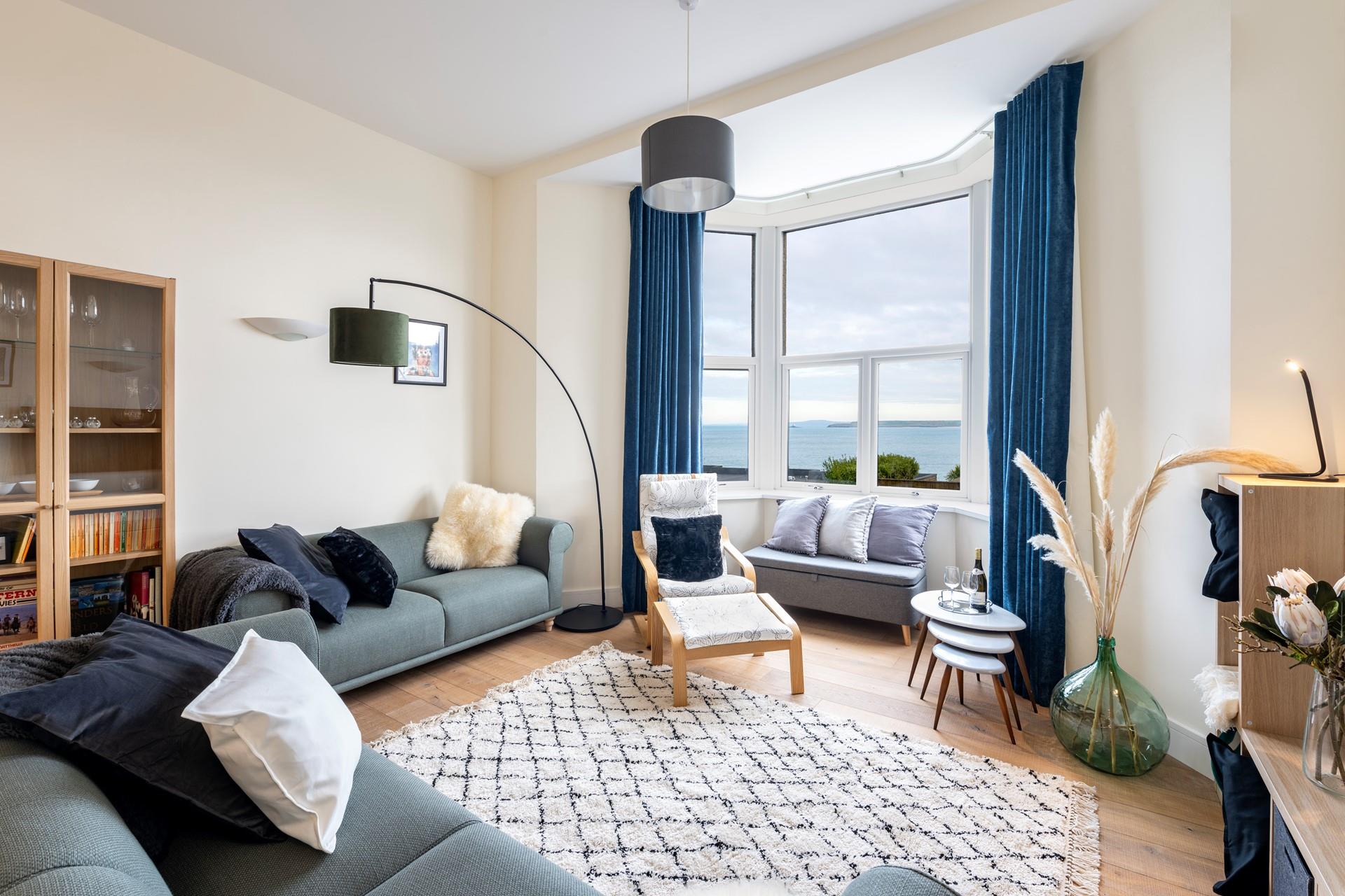 Comfortable furnishings and stylish decor make the sitting a great space to relax with the family around.