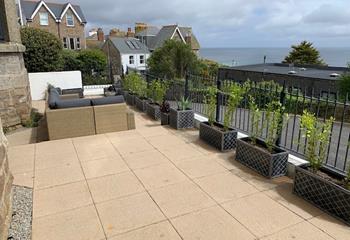 The front terrace takes advantage of the views across the Bay.