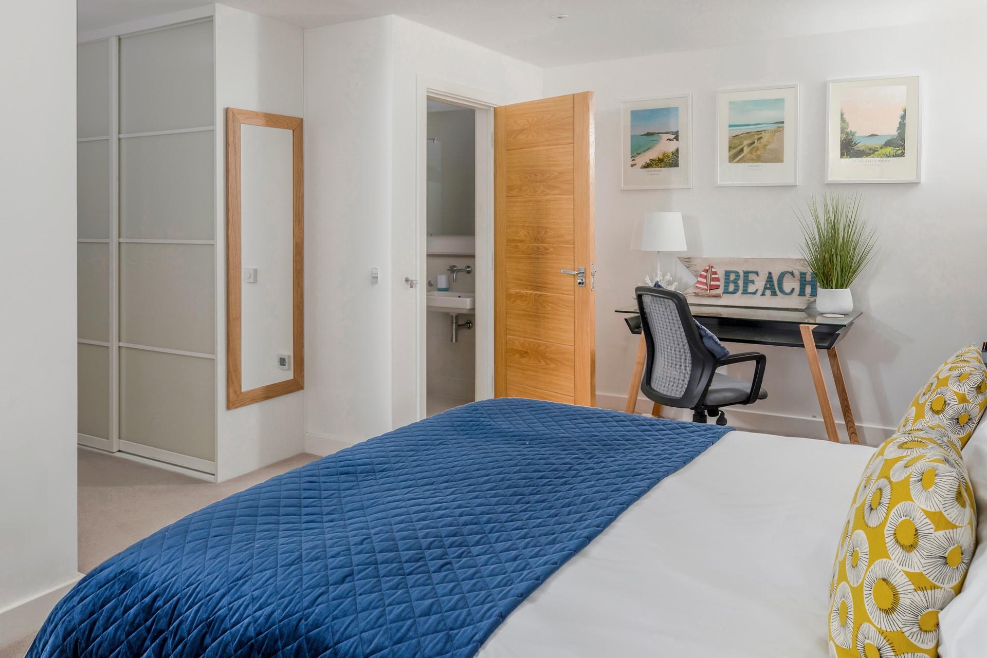 The super king size bed offers a relaxing night's slumber after a day spent on the beach.