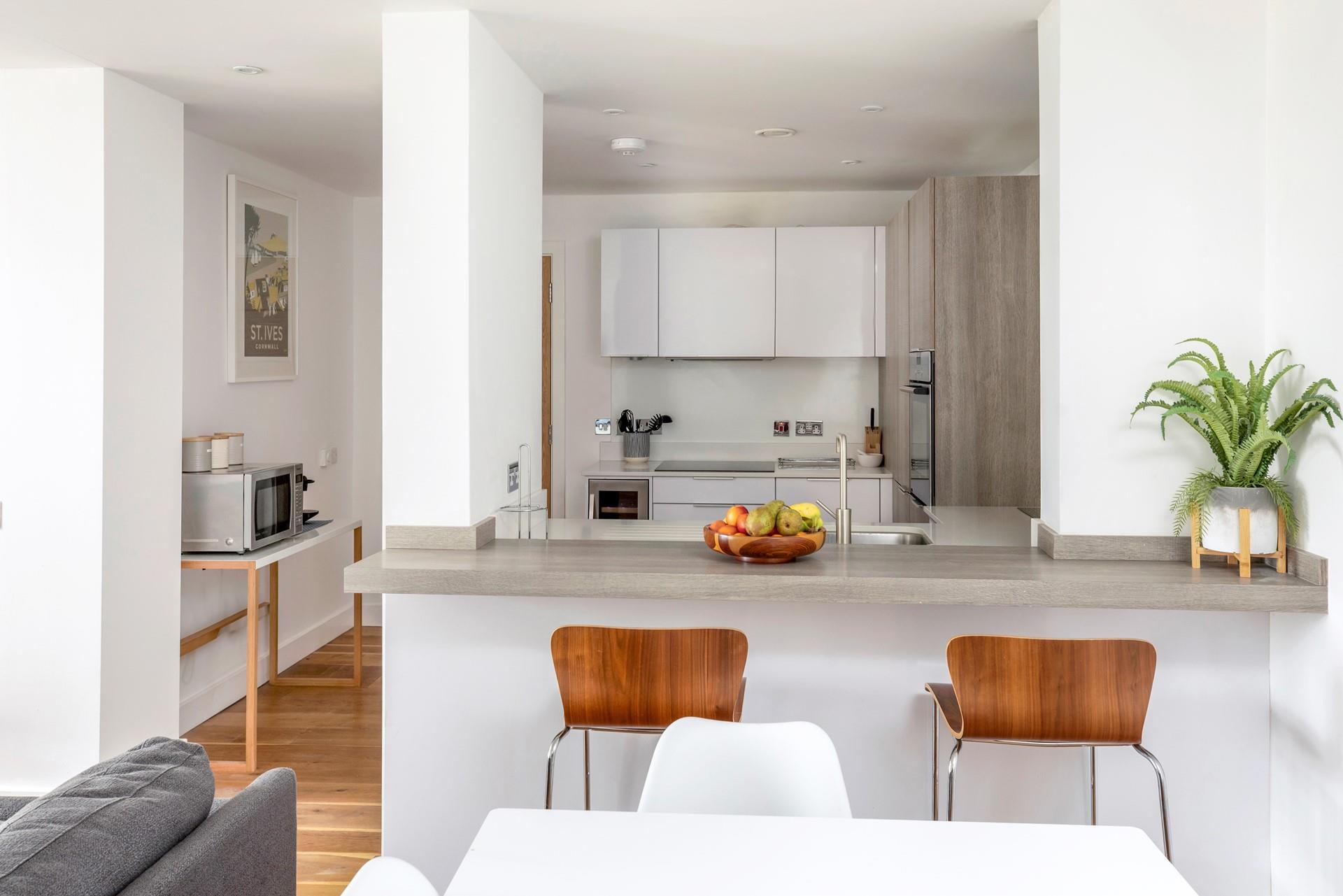 Open plan living means you can spend time together as a family in this stylish apartment.