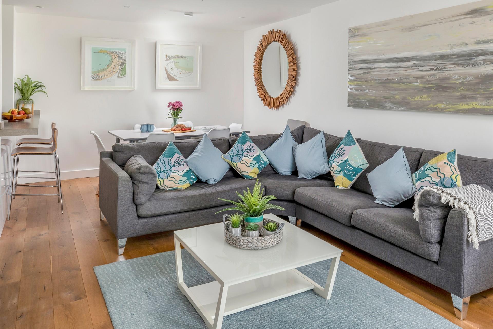 Relax on the large sumptuous sofa and put your feet up with a local gin.