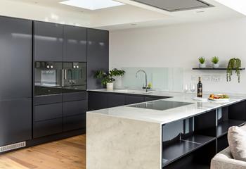 The high end kitchen is fitted with all the mod cons you could need, a self catering dream!