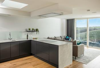 You can continue to enjoy the views whilst you cook, with full width windows framing the picturesque outlook.