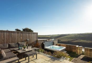 Relax and unwind in the steamy hot tub whilst taking in the views of The Gannel.
