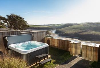 The hot tub is the perfect addition for taking a dip at any time of the day.