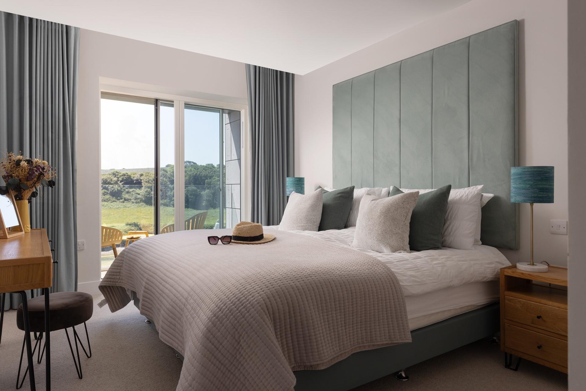 Sink into the opulent bed after a busy day exploring the coast.