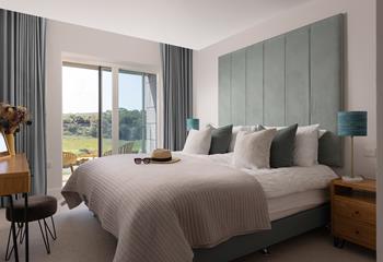 Sink into the opulent bed after a busy day exploring the coast.