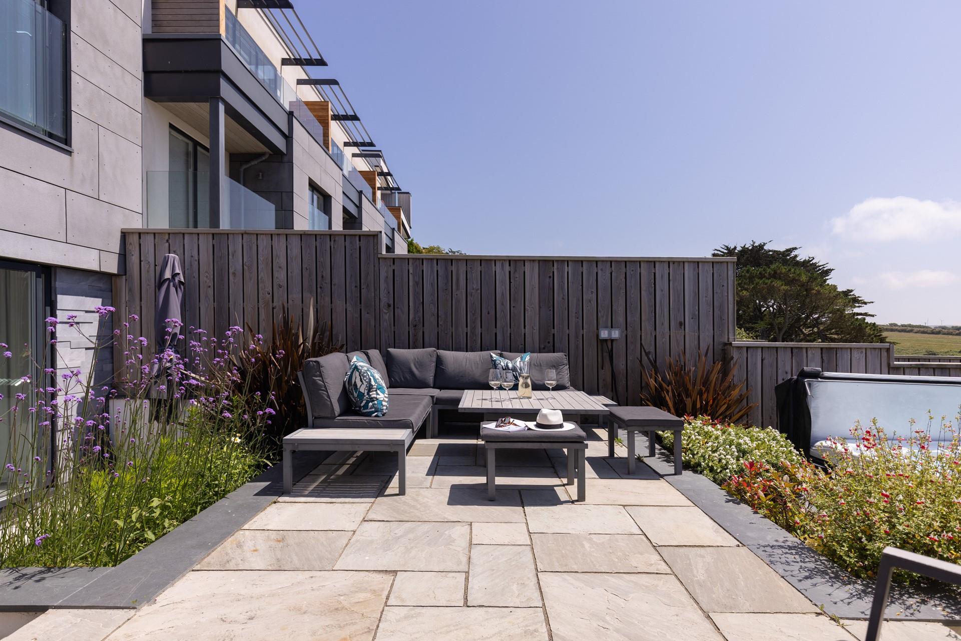 Dine alfresco in the stylishly landscaped garden.