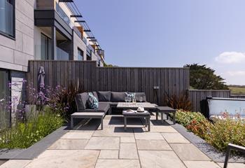 Dine alfresco in the stylishly landscaped garden.