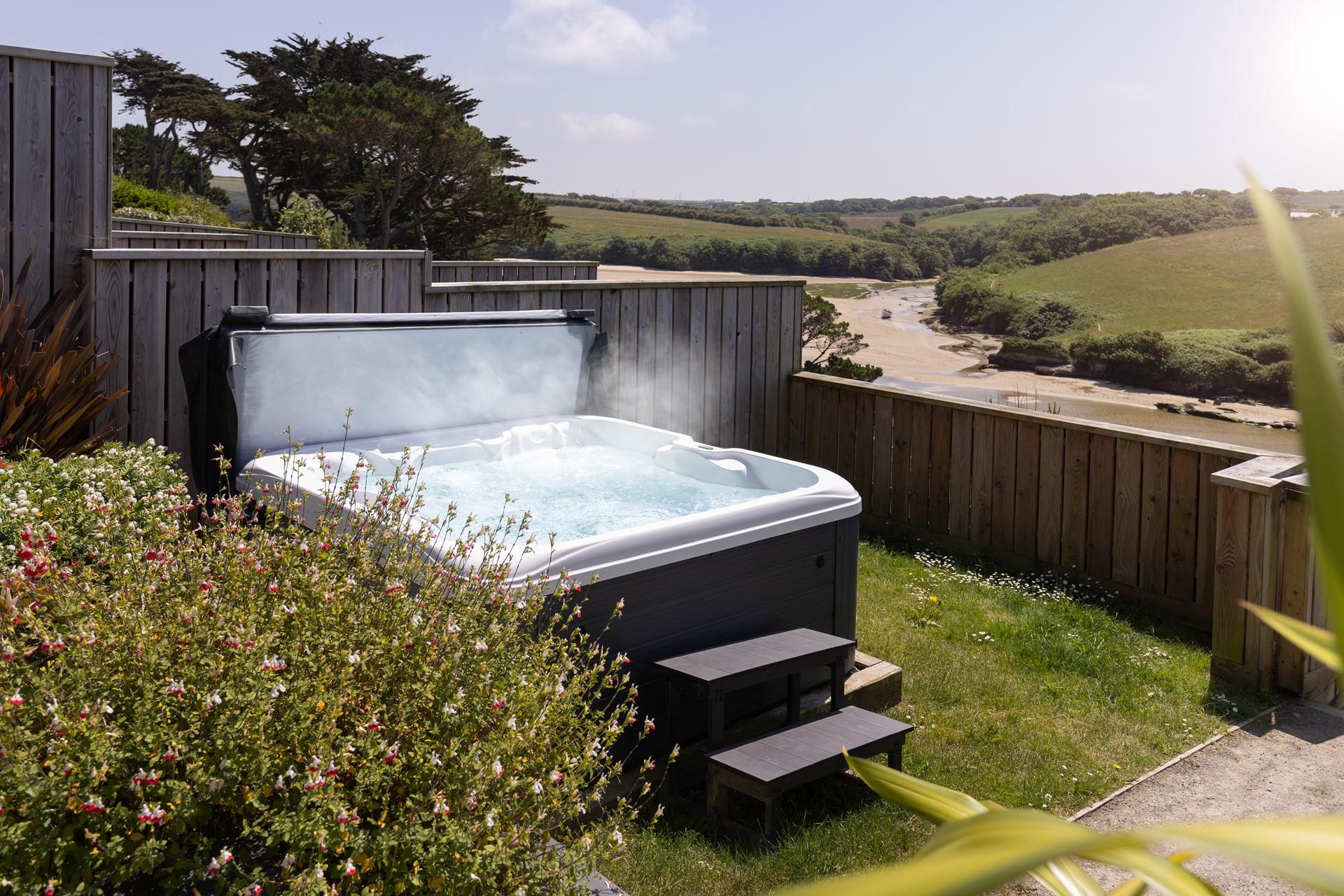 The hot tub is the perfect addition for taking a dip at any time of the day.