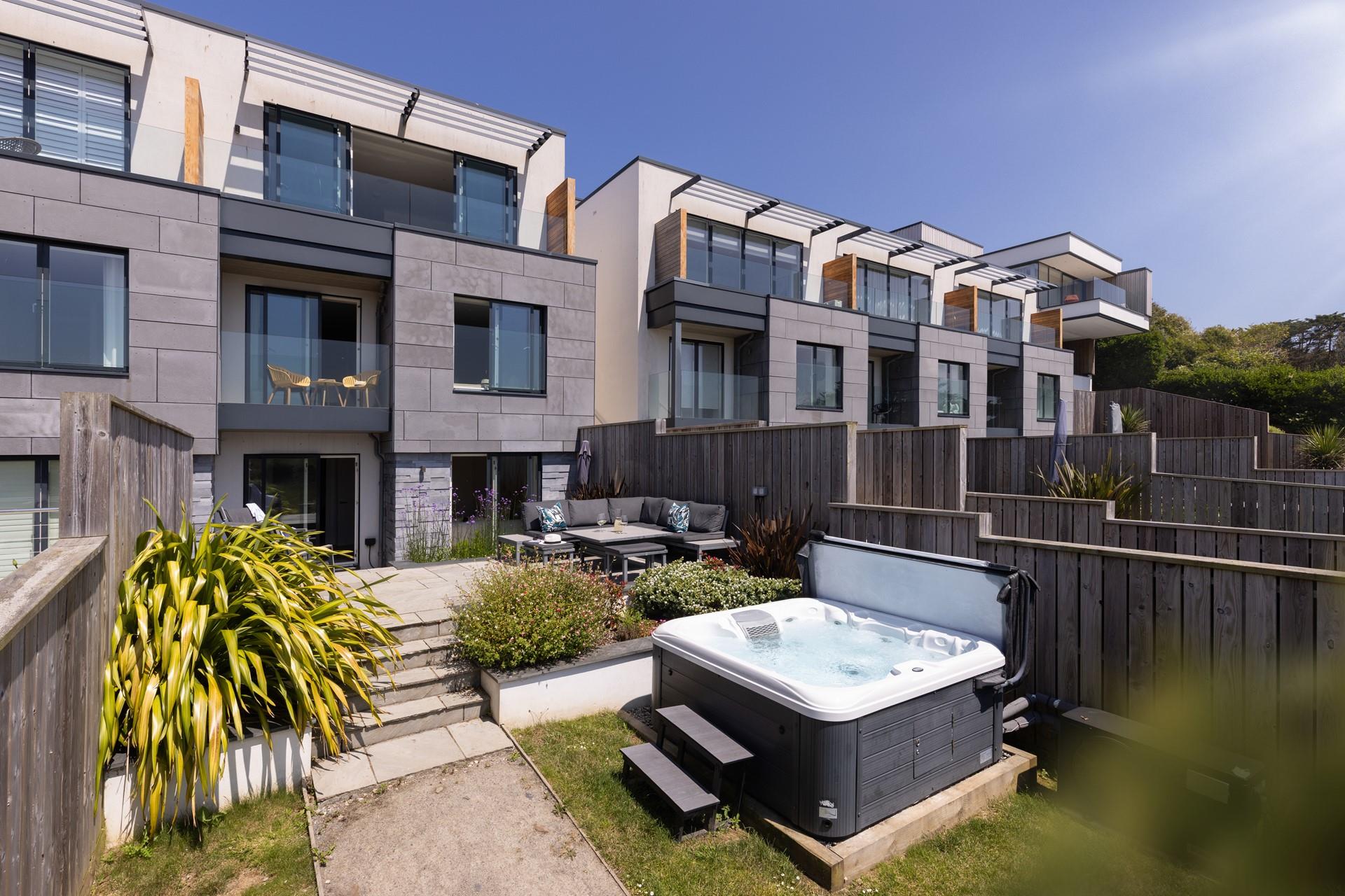 Enjoy the views from the hot tub, the perfect spot to watch the sun go down.